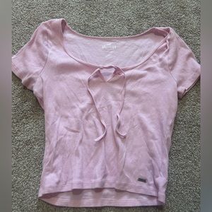 Pretty pink t-shirt with tie on top.